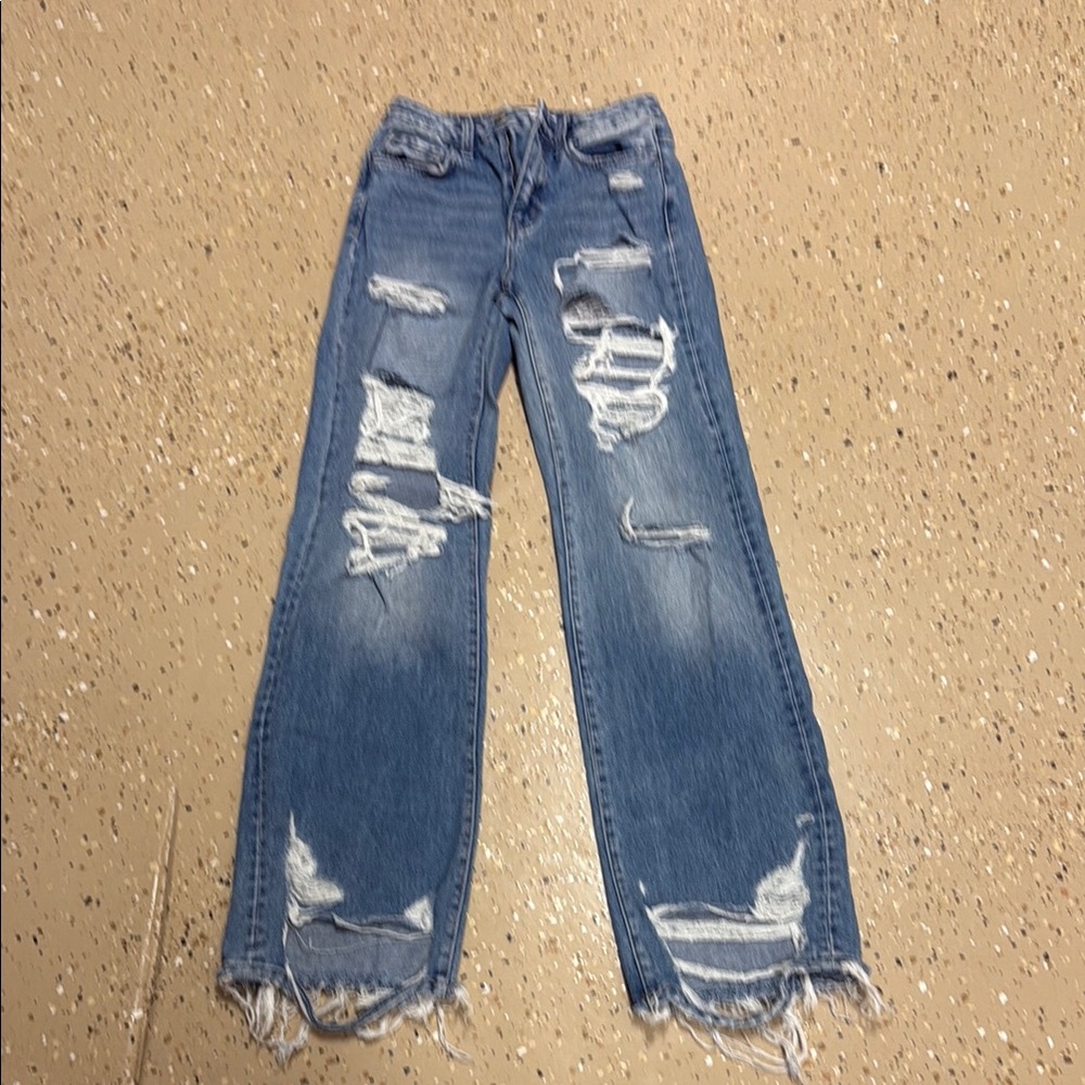Distressed Blue Jeans